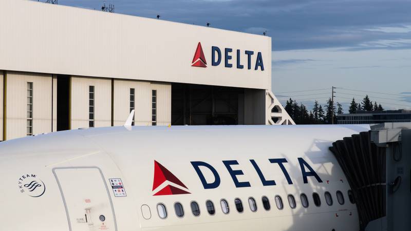 Delta plane in front of a hangar