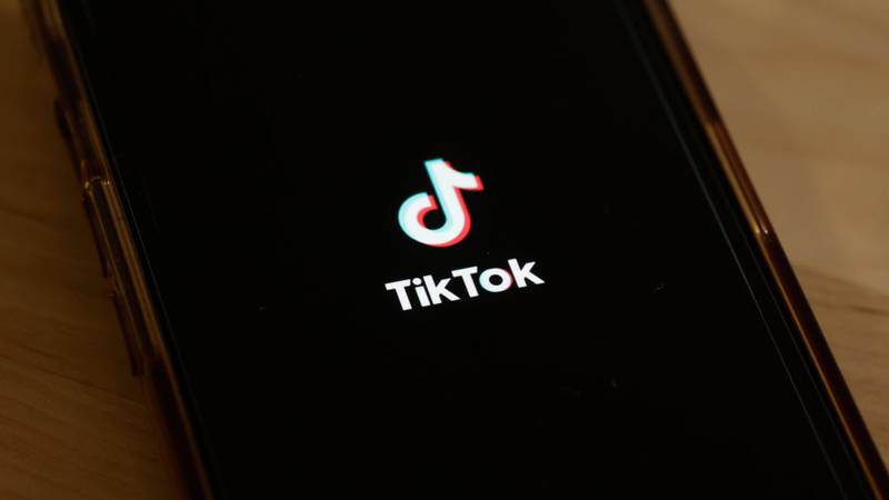 NEW YORK, NEW YORK - MARCH 13: In this photo illustration, the TikTok app is seen on a phone on March 13, 2024 in New York City. Congress is set to vote and pass a bill that could ban the popular app TikTok nationwide and be sent to the Senate for a vote. The bill would force the Chinese firm ByteDance to divest from TikTok and other applications that it owns within six months after passage of the bill or face a ban. Lawmakers argue that ByteDance is beholden to the Chinese government making the app a national security threat. (Photo Illustration by Michael M. Santiago/Getty Images)